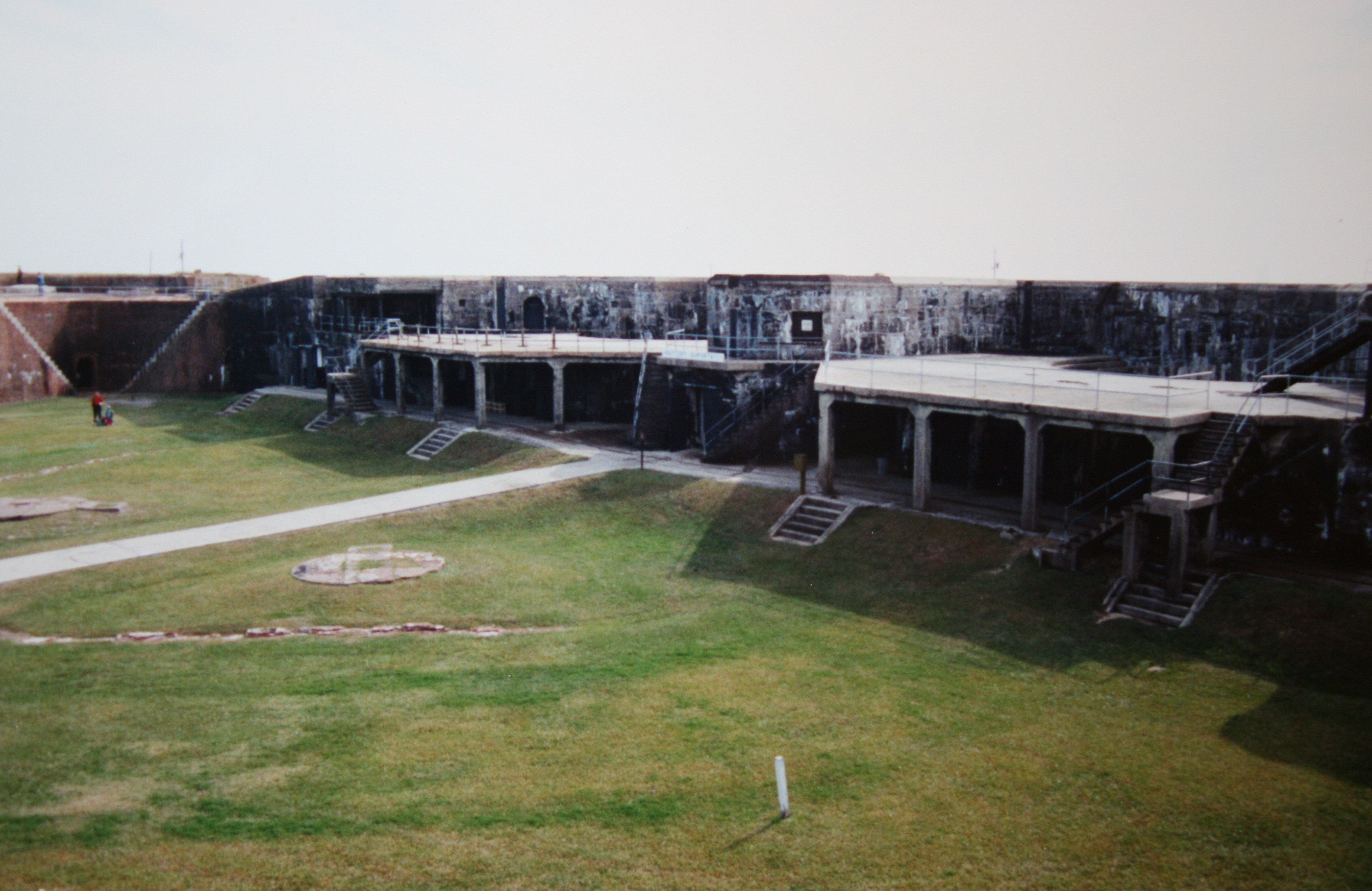 Brick entrance and grassy ramparts at Fort Morgan on Mobile Point
